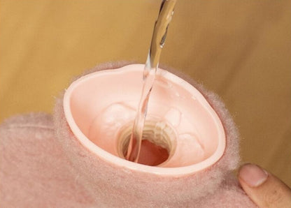 bouillotte eau chaude verser bouchon
