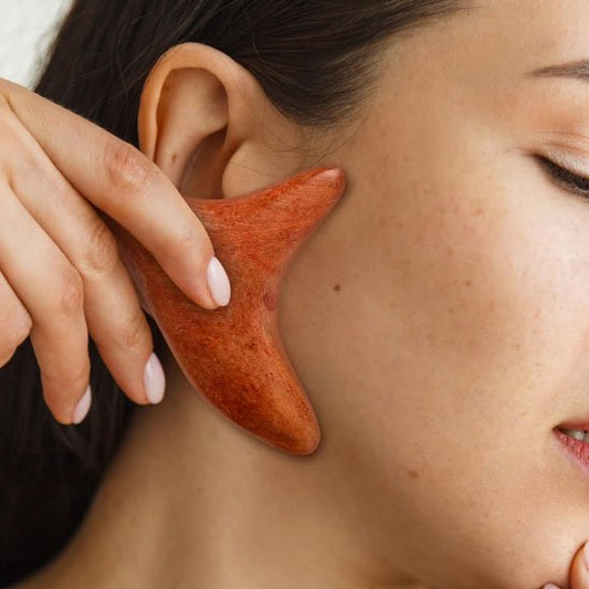 gua sha visage en bois