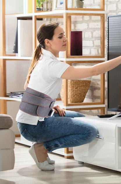 masseur dos ceinture lombaire femme utilise au quotidien