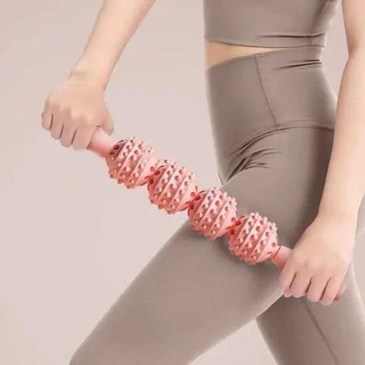 rouleau de massage rose jambe detente musculaire