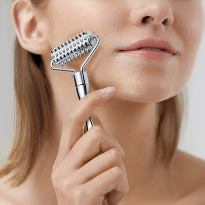Rouleau massage metal visage